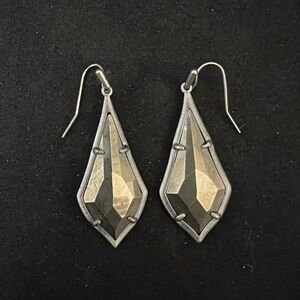 Kendra Scott statement earrings.